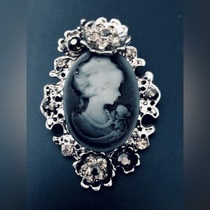 Elegant Black and Silver Cameo Brooch
